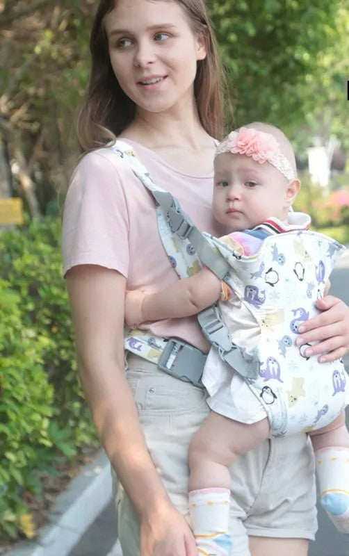 porte bébé mère et fille en promenade